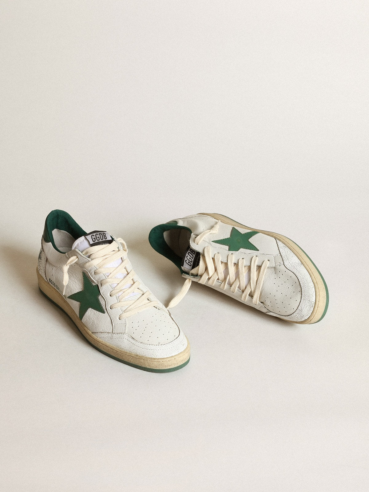 Ball Star in nappa bianca con stella e talloncino in pelle laminata verde