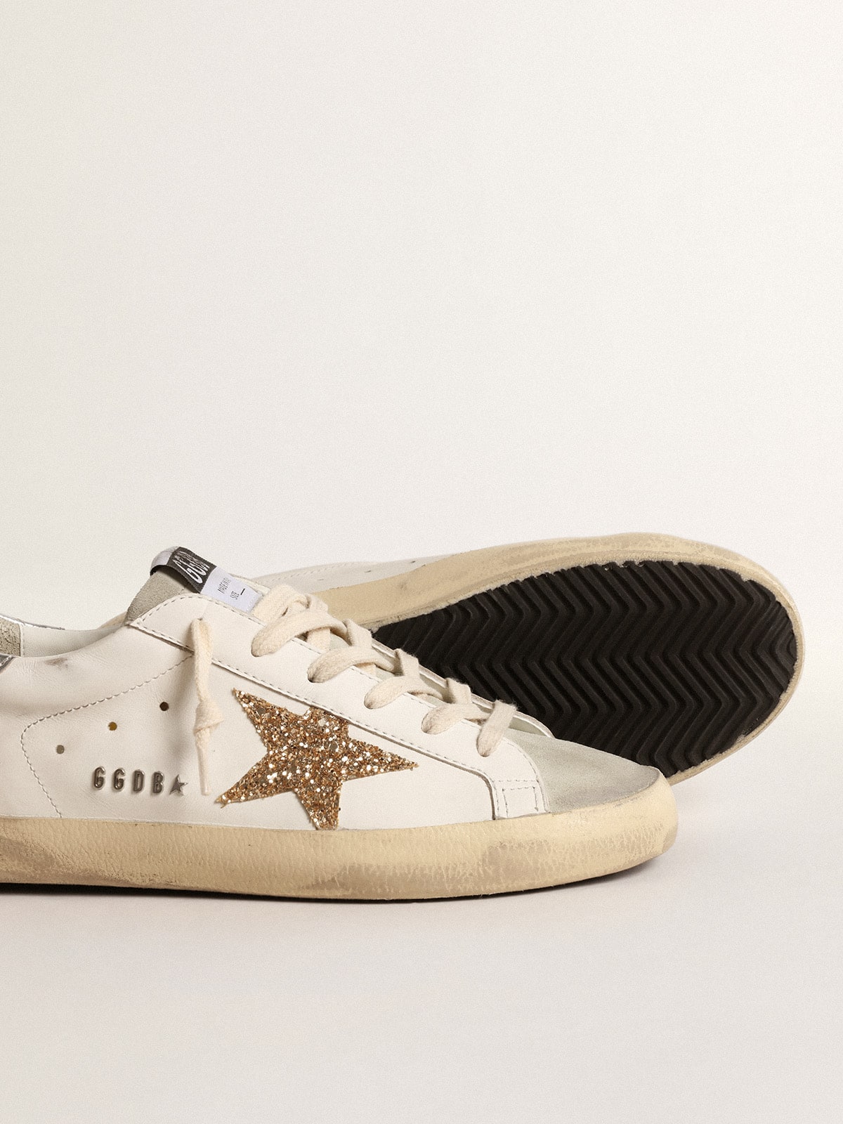 Super-Star Donna con stella in glitter oro e inserti in suede ghiaccio