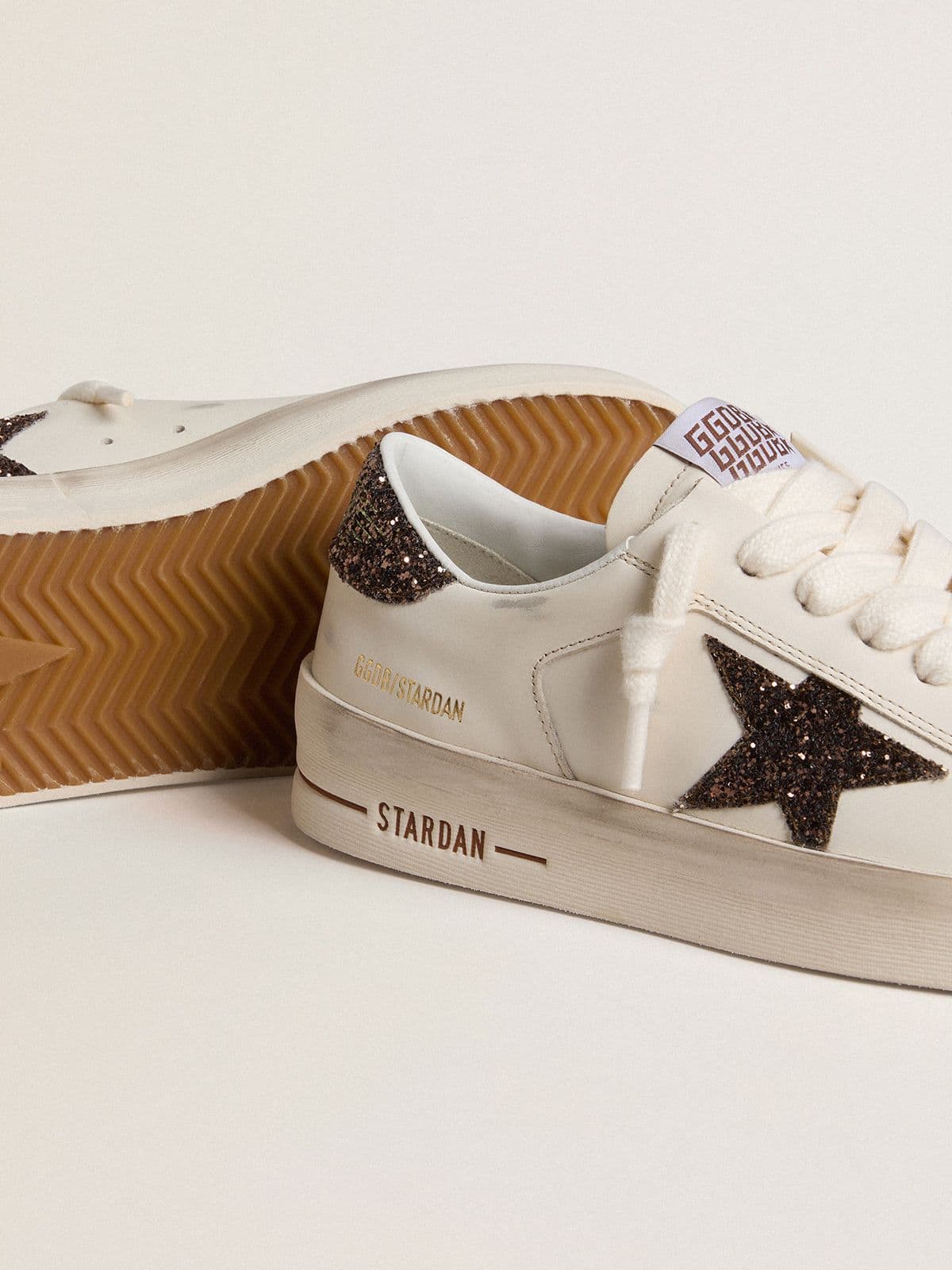 Super-Star con stella in glitter marrone e talloncino marrone